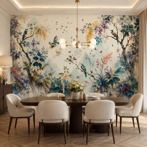 May include: A dining room featuring a large oval wooden table with a fluted base, surrounded by four cream-coloured upholstered chairs. A gold chandelier with six globe lights hangs above. The wall displays a mural of birds, trees, and flowers.