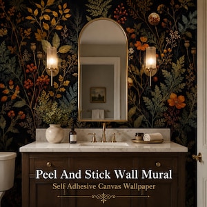Puede incluir: Un mueble de baño con encimera de mármol blanco, grifo dorado y espejo arqueado. La pared presenta un papel pintado floral oscuro con ilustraciones botánicas naranjas, amarillas y verdes. Texto: Peel And Stick Wall Mural Self Adhesive Canvas Wallpaper.