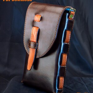 May include: A dark brown leather pouch with a flap closure secured by a lighter tan leather strap. The sides feature tan leather loops, and the text "Full Tutorial & PDF Download" and "De Ovi Studio" is visible in the image.
