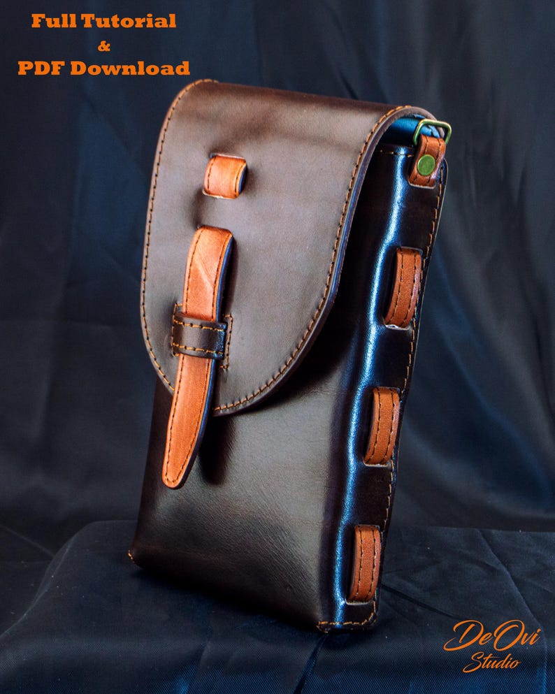 May include: A dark brown leather pouch with a flap closure secured by a lighter tan leather strap. The sides feature tan leather loops, and the text "Full Tutorial & PDF Download" and "De Ovi Studio" is visible in the image.