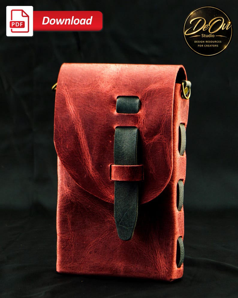 May include: A vertical rectangular pouch crafted from distressed red leather with a textured finish. It features a dark charcoal leather strap closure that threads through a front flap and dark leather side lacing with brass hardware rings.
