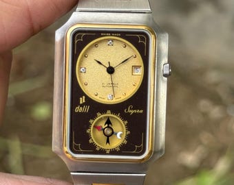 Orologio automatico vintage Dalil Supra Qibla Compass, svizzero, oro, quadrante marrone, raro.