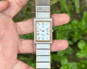 Zegarek kwarcowy Caran d’Ache Vintage Tank: szwajcarski zegarek o prostokątnej konstrukcji i średnicy 25 mm