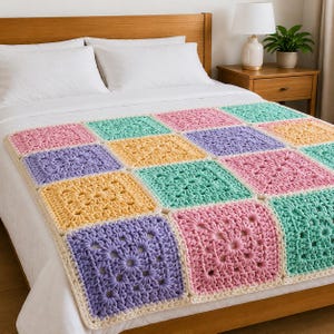 May include: A handmade crochet blanket featuring a grid of square motifs in pastel shades of pink, yellow, lavender, and mint green. Each square is joined with a cream-coloured yarn border, creating a textured, repeating pattern across the surface.