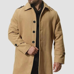 May include: A tan overcoat with a classic design. The coat features a notched collar, button-down closure, and buttoned cuffs. The coat is made of a soft, textured material.