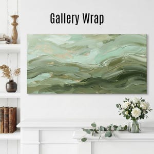 May include: A gallery wrapped canvas art piece with an abstract landscape design. The artwork features shades of green and gold, with visible brushstrokes creating a textured effect. The text "Gallery Wrap" is displayed at the top.