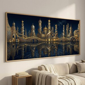 May include: A rectangular wall art print featuring an intricate, ornate city with golden towers, domes, and arched bridges set against a dark blue night sky. The architecture displays detailed filigree patterns and is reflected in water below.