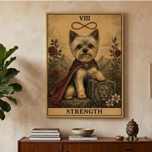 May include: A rectangular wall art print featuring a tarot card design titled STRENGTH with the Roman numeral VIII. The illustration depicts a small tan dog wearing a red cape, sitting beside a stone lion carving, with roses and an infinity symbol.