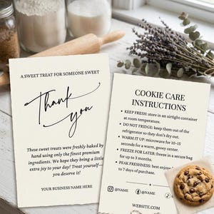 May include: Two off-white rectangular cards with deckled edges. The left card reads A SWEET TREAT FOR SOMEONE SWEET, Thank you, and text about premium ingredients. The right card reads COOKIE CARE INSTRUCTIONS with storage tips and social media icons.