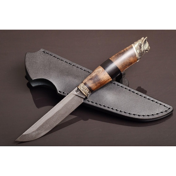 500-layer Damascus blade with a hand-carved Lynx totem handle at $783 — this is borderline functional sculpture, a serious luxury heirloom piece.