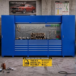 May include: A large blue metal garage storage system featuring a central pegboard wall filled with various hand tools and a metallic engine block. The unit includes multiple drawers and overhead cabinets. A yellow sign reads: PLEASE READ BEFORE PURCHASING THIS IS A DIGITAL STL FILE ONLY.