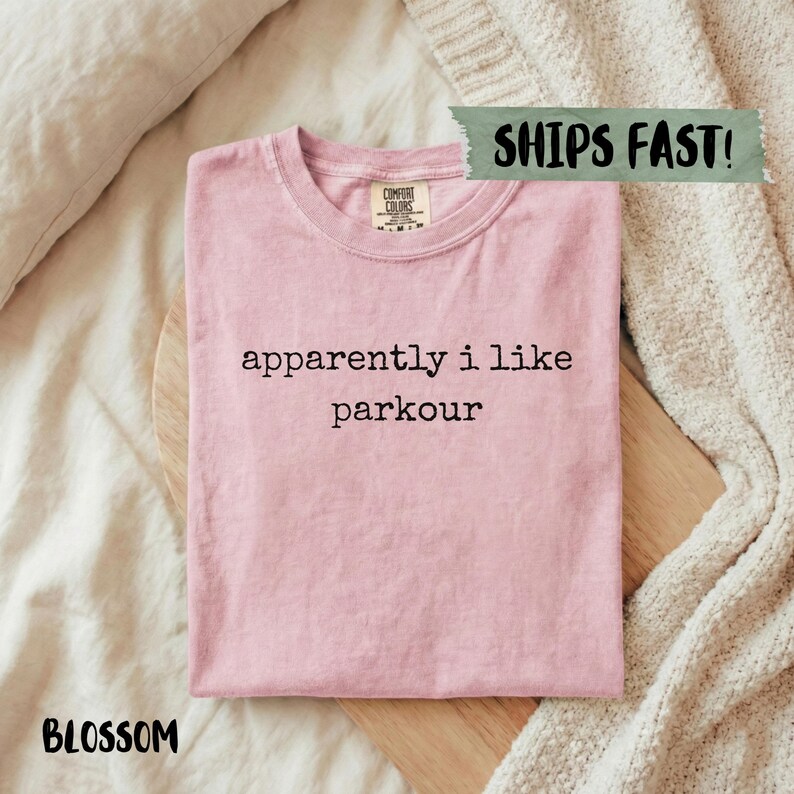 Comfort Colors pink t-shirt with "apparently i like parkour" text.
