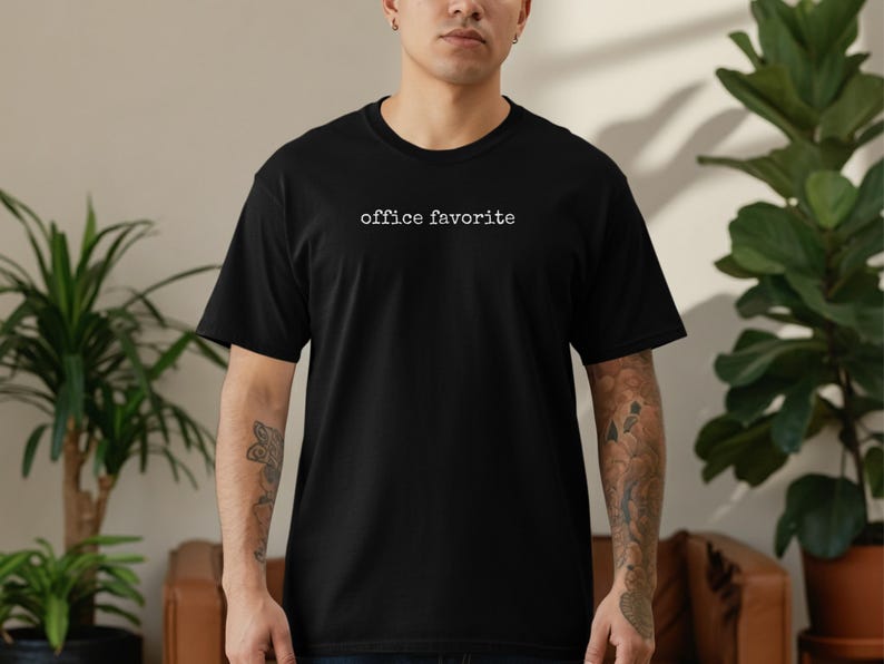Black t-shirt with "office favorite" printed in white text.