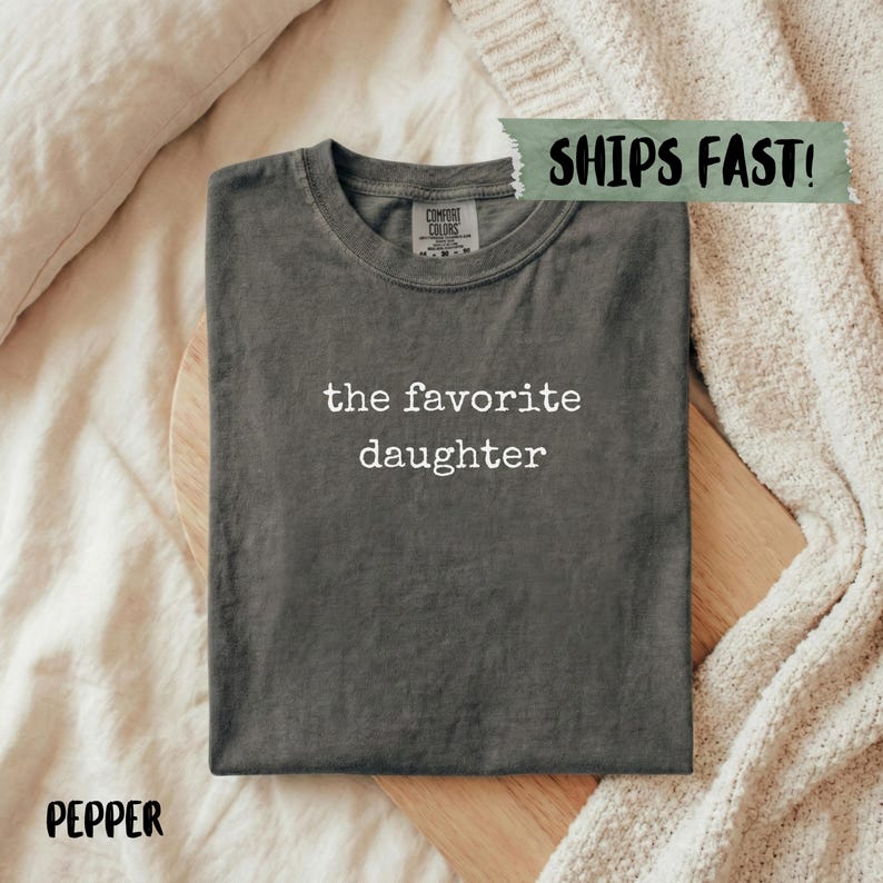 Comfort Colors t-shirt with "the favorite daughter" printed on it.