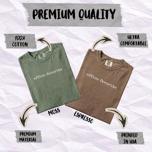 Two t-shirts, moss and espresso, with "office favorite" printed on them.
