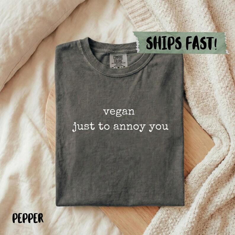 Charcoal Comfort Colors t-shirt with "vegan just to annoy you" text.
