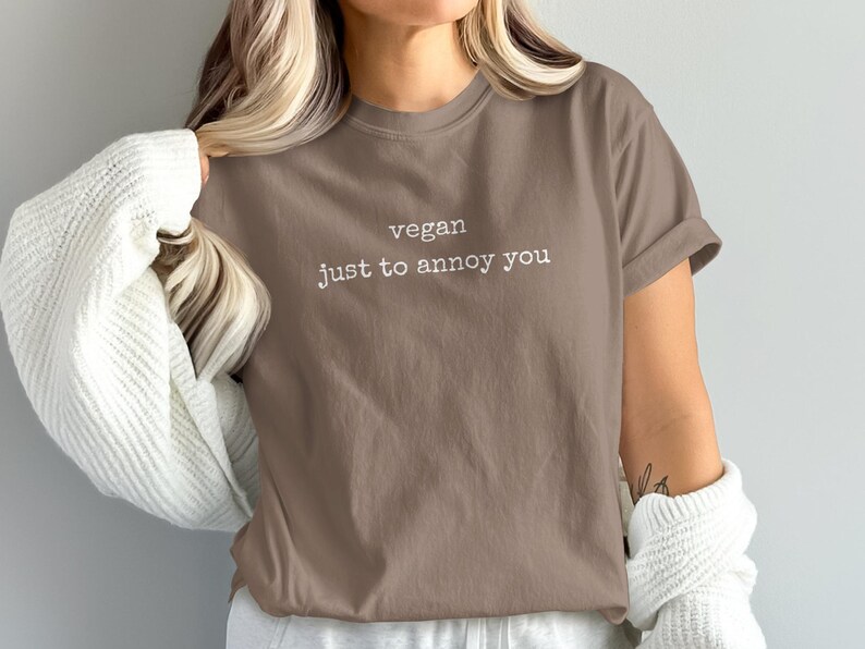 Brown t-shirt with white text "vegan just to annoy you".