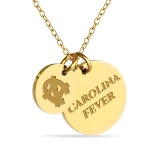 May include: Gold necklace with two round pendants. One pendant features the University of North Carolina Tar Heels logo, and the other pendant says "Carolina Fever".