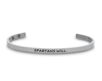 May include: A silver bangle bracelet with the inscription "SPARTANS WILL."