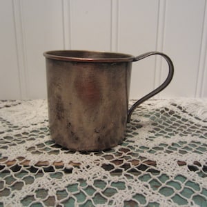 Silver plate childs mug or cup that was made by 1881 Rogers (Oneida)
