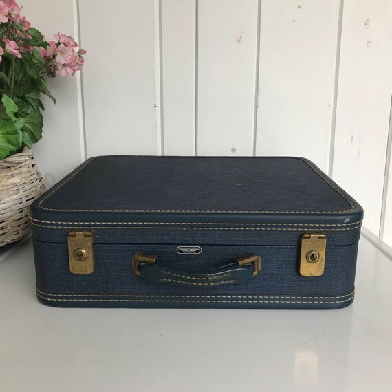dark blue suitcase