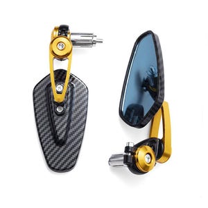 May include: A pair of motorcycle bar end mirrors. The mirrors have a carbon fiber pattern, gold accents, and a blue-tinted mirror surface. The mounting hardware is silver.