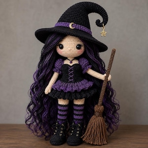May include: A handcrafted crochet doll featuring long wavy purple and black hair, wearing a black witch hat with a crescent moon charm and a dangling star. The doll wears a black and purple dress with a lace-up bodice, striped socks, and black boots, holding a brown broom.