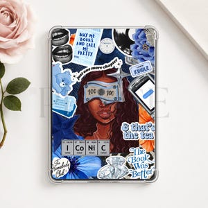 May include: A clear tablet case featuring a collage of stickers including a person with a 100 dollar bill over their eyes, a blue bear, a vintage phone, a diamond, and text reading "BUY ME BOOKS AND CALL ME PRETTY", "just one more chapter", and "ICONIC".