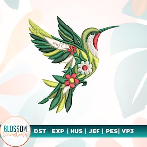 May include: An embroidered hummingbird design with green, yellow, red, and white details. The bird is surrounded by flowers and leaves. The design is set against a white background with a floral pattern. The logo "Blossom Canvas Crafts" is in the lower left corner.