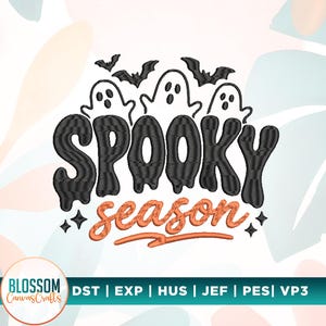 May include: An embroidery design featuring three white ghosts and two black bats above the black text SPOOKY and the orange text season. The design includes small four-pointed stars and a horizontal orange line underneath the word season.