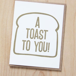 Un toast à toi, des félicita tions idiotes, une carte de presse-lettres
