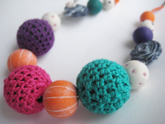 Items similar to Colorful beaded necklace hand made polymer clay and