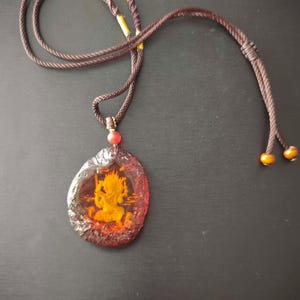 Natural Blue Amber Mahakala Protective Buddha Talisman, boosts wealth fortune and guards all living things.
