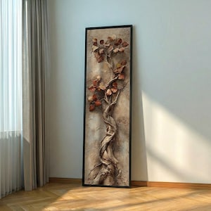 Peut inclure: Une œuvre d'art murale encadrée représentant un arbre en trois dimensions texturé. L'arbre a un tronc torsadé et des branches avec des feuilles brun-rouge. L'œuvre est sur un fond beige et encadrée en noir.