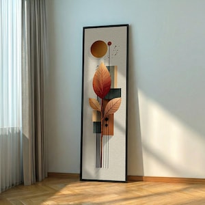May include: Abstract wall art featuring a botanical design with a black frame. The artwork showcases stylized leaves in shades of orange and brown, geometric shapes, and a circular element. The vertical composition is set against a neutral background.