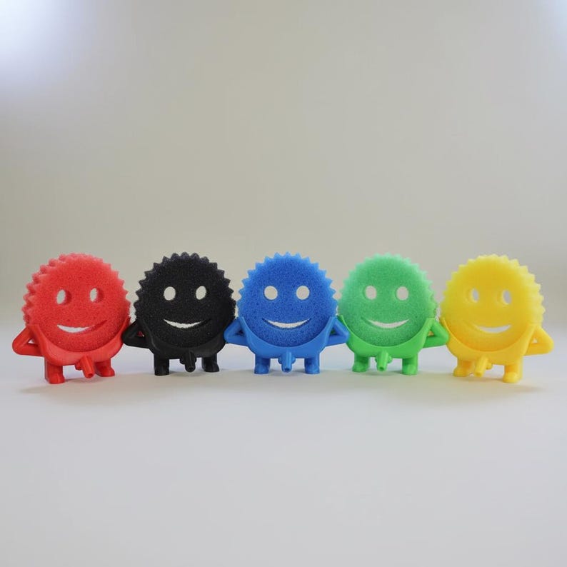 May include: Five colorful, smiling sponge figures in red, black, blue, green, and yellow. Each sponge has a circular body with a smiling face, arms, and legs. The sponges are arranged in a row against a white background.