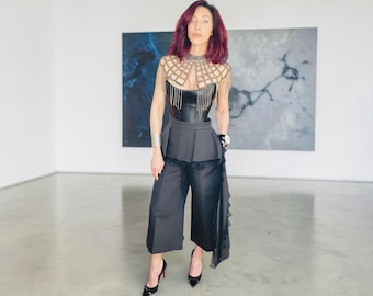 Alexander McQueen peplumbroek met wijde pijpen en kanten rand | Sculpturale zwarte maatwerk | IT 38 | Sarah Burton-tijdperk