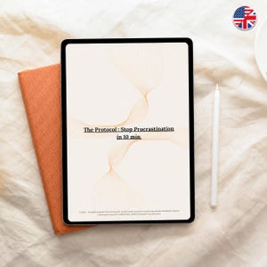 May include: A black tablet displays the text "The Protocol: Stop Procrastination in 10 min." with an abstract design. An orange book and a white stylus are next to the tablet on a white surface.