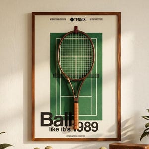 May include: A framed wall poster featuring a graphic of a green tennis court and a brown tennis racket hanging from a hook. The text reads National Tennis Association, Tennis, and Ball like it's 1989. The poster has a cream background and a wood frame.