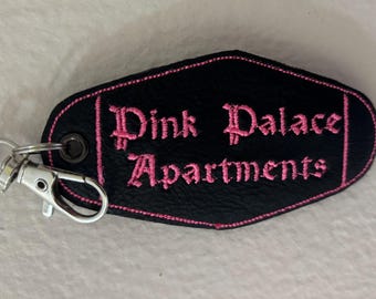 Coraline Pink Palace Apartments Faux Leather Keychain