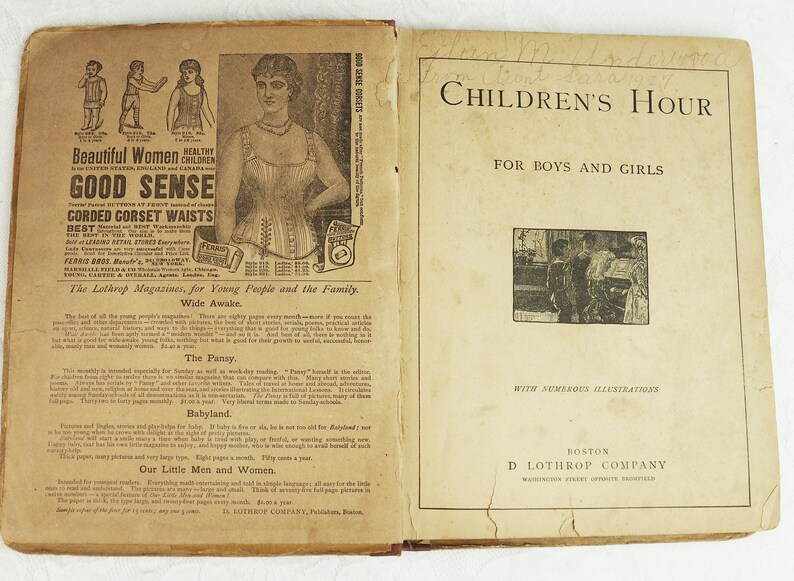 May include: A vintage book cover for "Children's Hour" magazine, a publication for boys and girls. The cover features a black and white illustration of children playing in a room. The text "Children's Hour" is printed in large, bold letters at the top of the cover. The text "For Boys and Girls" is printed below the title. The cover also includes the text "With Numerous Illustrations" and the publisher's information: "Boston, D Lothrop Company".