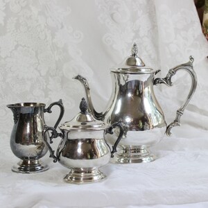 Silverplate  Coffee/ Tea Set with creamer and covered sugar bowl- Antique / Vintage- 4 piece Set- William Rogers- Wm Rogers