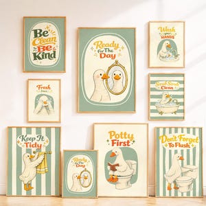 May include: A collection of nine framed wall art prints featuring illustrations of white ducks in bathroom settings. Each print includes text such as Be Clean Be Kind, Ready For The Day, Wash Your Hands, Fresh Face, Scrub Scrub Clean, Keep It Tidy, Potty First, and Don't Forget To Flush.