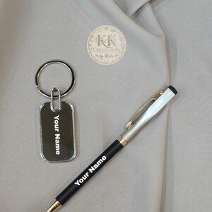 Cusomised Black pen with attactive keychain set for corporate gifting and gifting purpose