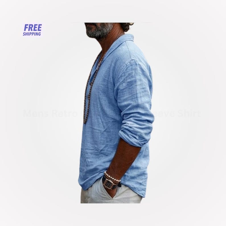 Peut inclure: Chemise &agrave; manches longues bleu clair avec un col. La chemise est faite d'un tissu l&eacute;ger et a une coupe d&eacute;contract&eacute;e. L'image comprend &eacute;galement le texte "FREE SHIPPING".