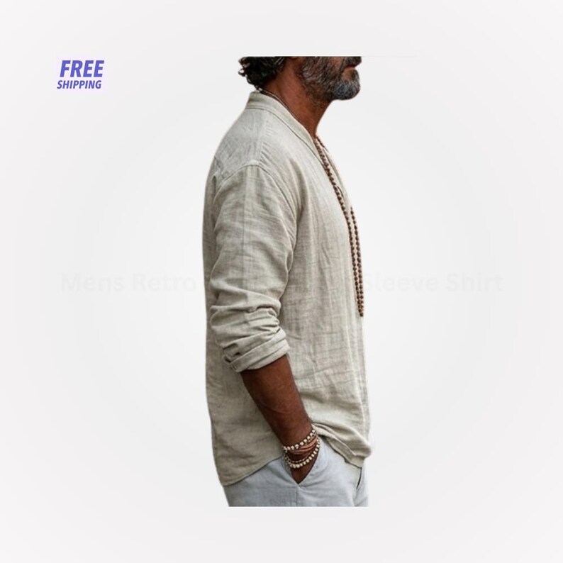 Peut inclure: Une chemise beige &agrave; manches longues avec un col officier. La chemise est faite d'un tissu l&eacute;ger et a une coupe d&eacute;contract&eacute;e. L'image montre &eacute;galement un collier de perles et des bracelets. Les mots "FREE SHIPPING" sont dans le coin sup&eacute;rieur gauche.
