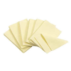 May include: A stack of ten yellow microfiber cloths, folded in a fan shape. The cloths are soft and absorbent, ideal for cleaning delicate surfaces.