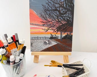 Vibrant Coastal Sunset Over Water