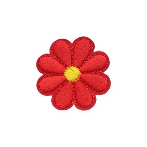 May include: A red flower-shaped embroidered patch with eight rounded petals and a circular yellow center. The embroidery features a dense stitch pattern with a defined border around the edges of the petals and the central yellow core.
