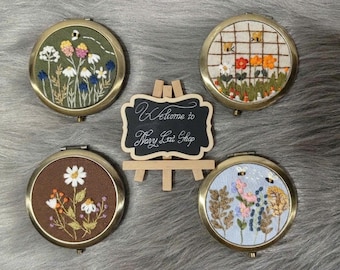 Espejo de bolsillo de mano